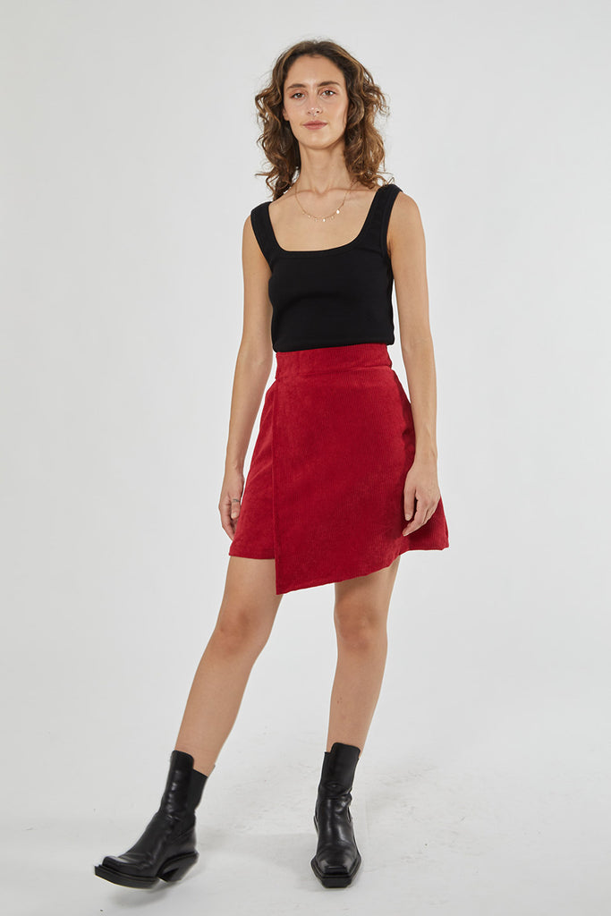 Faded Line asymmetrical short skirt made of red corduroy with dead stock fabric one real pocket at the side.