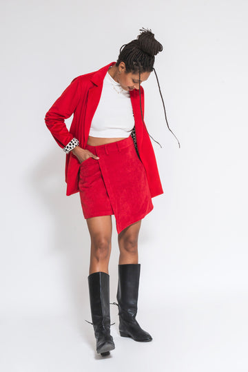 Faded Line asymmetrical short skirt made of red corduroy with dead stock fabric front.